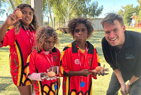 Perkins trainer Steven Blake with students from Jigalong community.