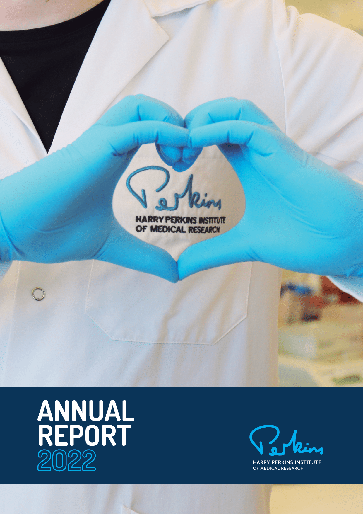 image shows two hands in blue medical gloves in a heart shape around the Harry Perkins Institute of Medical Research logo